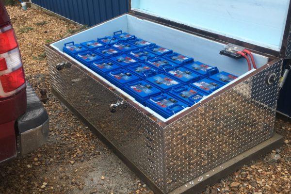 Battery Bank for off grid system with custom built battery box by Top Gun Solar & HVAC.